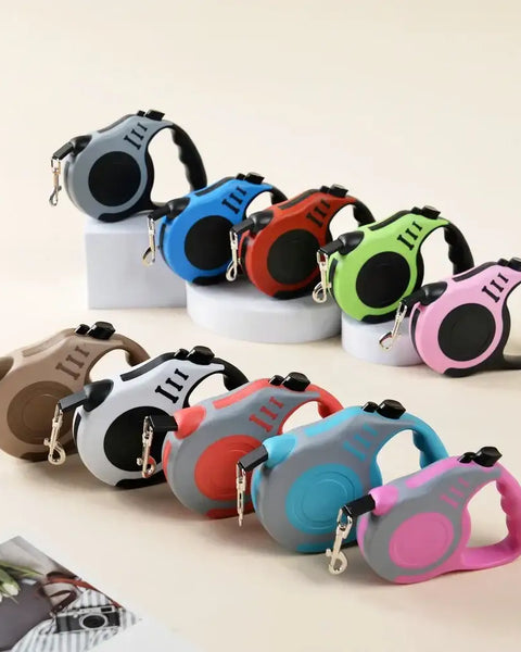 Strong automatic retractable nylon leash for small and medium dogs and cats, ensuring safety, control, and comfort during walks with ergonomic handle and tangle-free design.