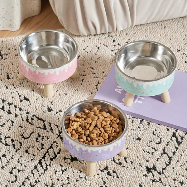 Elevated ice-cream style pet feeding bowl for cats and small to medium dogs designed to improve posture and reduce neck strain during eating and drinking