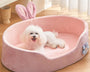 Discover the Nuvoré Nest pet bed, featuring soft crystal velvet, supportive cushioning, raised sides, a non-slip base, and a removable washable cover for dogs and cats.