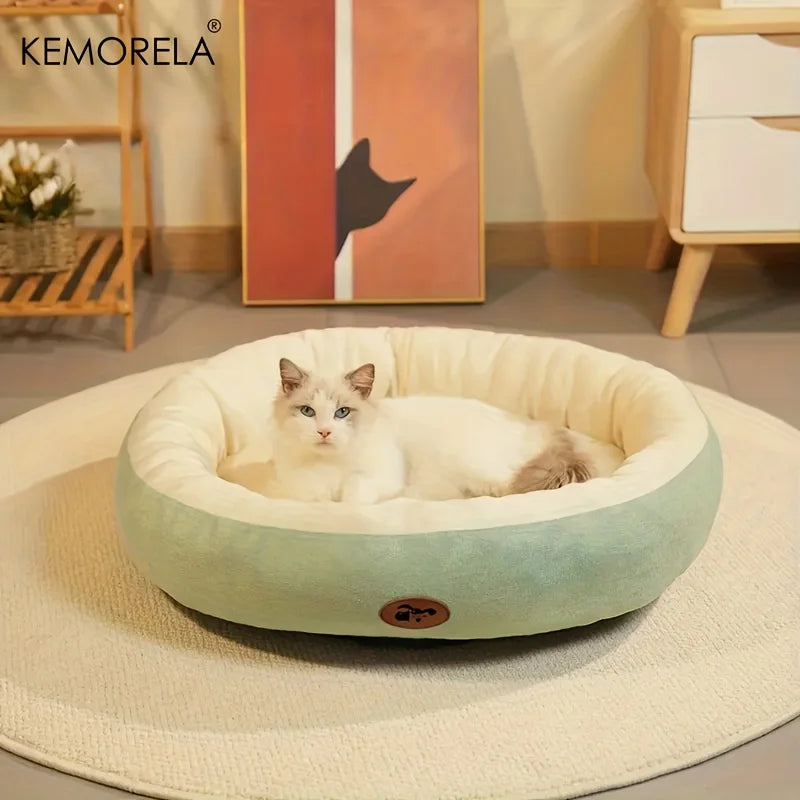 Oval plush pet bed for dogs and cats that provides soft cushioning, body support, and a secure resting space for relaxation and sleep.