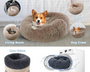 Donut-shaped plush pet bed made with long plush fabric and PP cotton filling, designed to provide warm orthopedic-style comfort and a secure calming sleep environment for cats and dogs