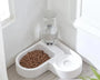 2-in-1 automatic pet bowl for dogs and cats that provides combined food and water feeding with a spill-resistant design for daily use.