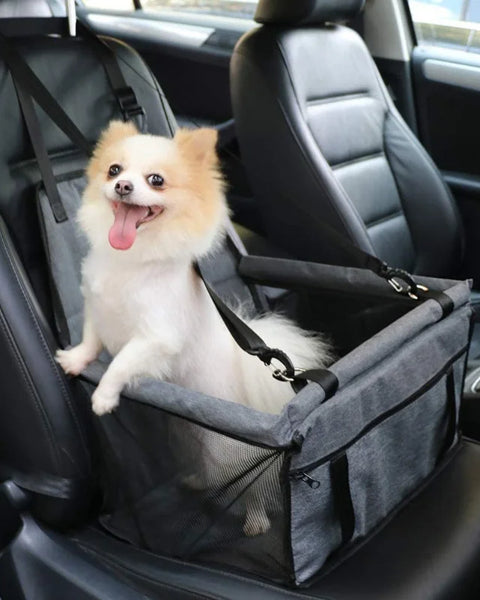 Foldable dog car seat hammock for dogs and cats that protects vehicle seats and provides safe travel comfort during trips.