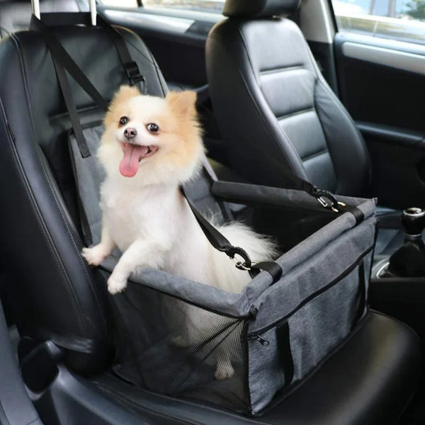 Foldable dog car seat hammock for dogs and cats that protects vehicle seats and provides safe travel comfort during trips.