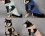 Wind-resistant cotton and polyester pet jacket with adjustable fit and two-leg design for dogs and cats to stay warm and comfortable during outdoor walks