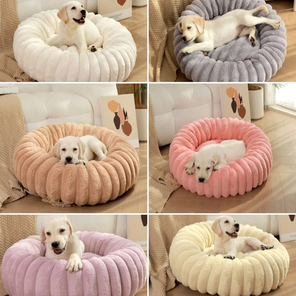 Round plush pet bed for dogs and cats that provides soft cushioning, anxiety relief, and supportive sleep comfort.