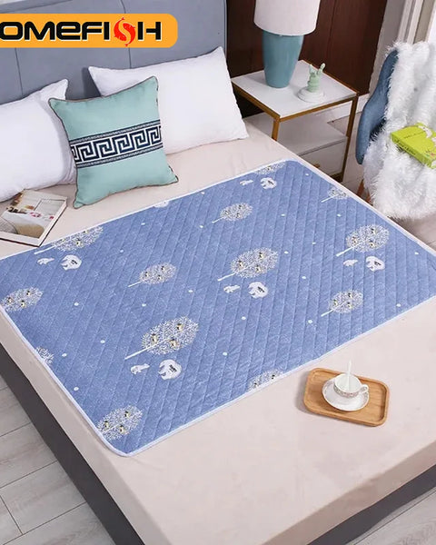 Washable waterproof pet training mat for dogs and cats that absorbs moisture and protects floors, beds, and furniture from accidents.