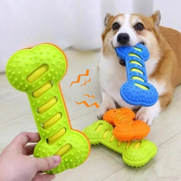 Durable bone-shaped rubber chew toy for dogs with built-in squeaker designed to promote dental health, reduce boredom, and support healthy chewing behavior