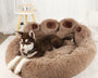 Breathable plush pet bed for dogs and cats that provides cushioned sleep support, warmth, and anxiety relief for daily rest.