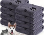 Microfiber pet towel for dogs and cats that quickly absorbs moisture and speeds up drying after baths, swimming, or walks.