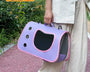 Foldable breathable pet carrier bag for small dogs and cats with mesh ventilation and easy-access opening for safe and comfortable travel