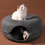Cozy felt cat tunnel and bed for 1-2 cats. Soft, durable, and multifunctional design provides comfort, play, and interactive hiding space. Easy to clean, split into separate beds, and suitable for multi-cat households.